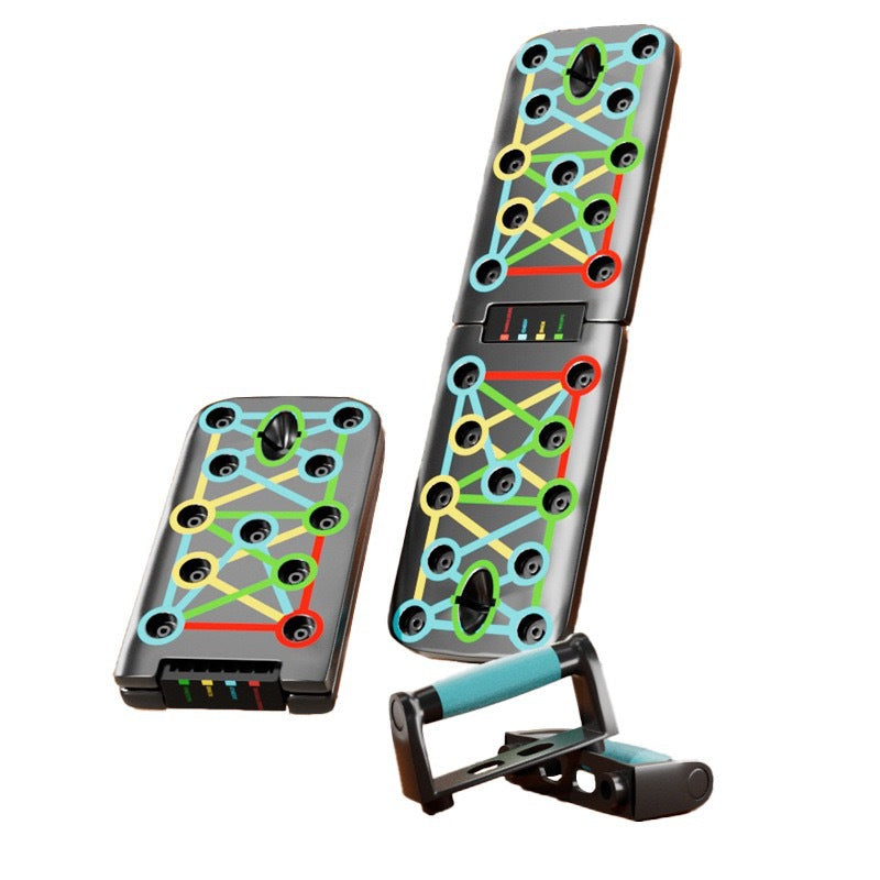 A foldable push-up board shown in two positions on a white surface, with colorful printed exercise path graphics across the metal surface. 